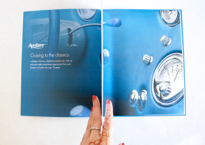 Interior of Brochure, silver foil page insert. Vintage car radio dash accompanies "Crusing to the Classics" headline positioning Aprilaire as an established trusted brand.